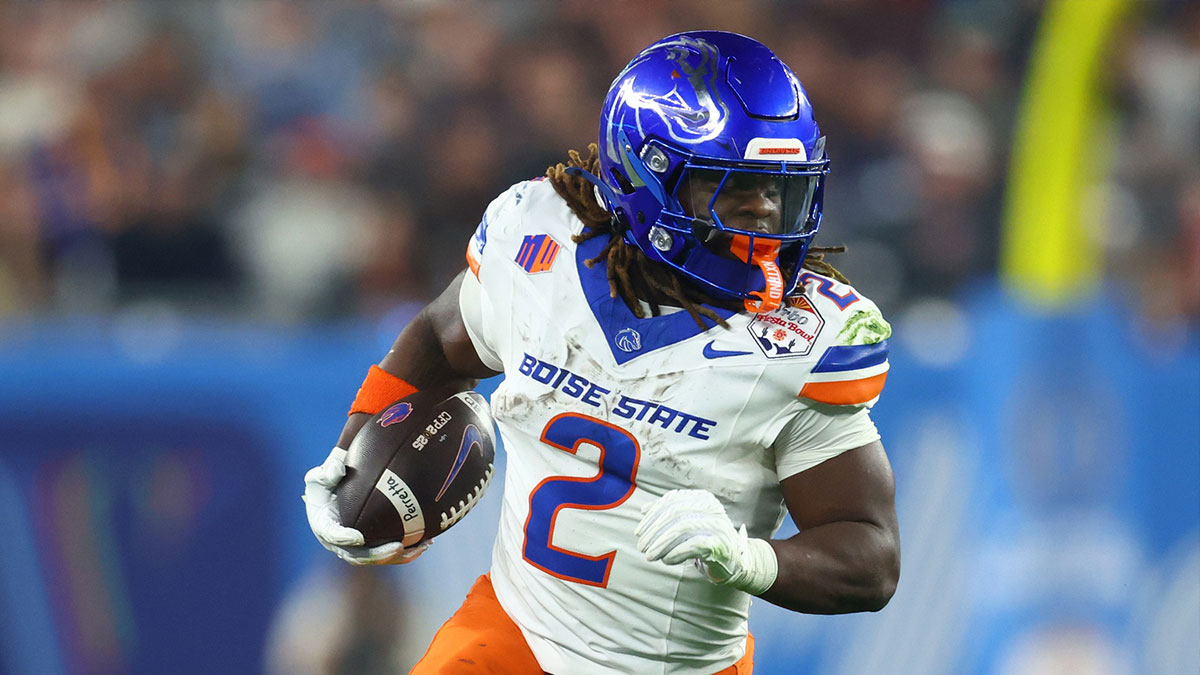 Boise State Broncos running back Ashton Jeanty (2) rushes the ball against the Penn State Nittany Lions during the first half in the Fiesta Bowl at State Farm Stadium.
