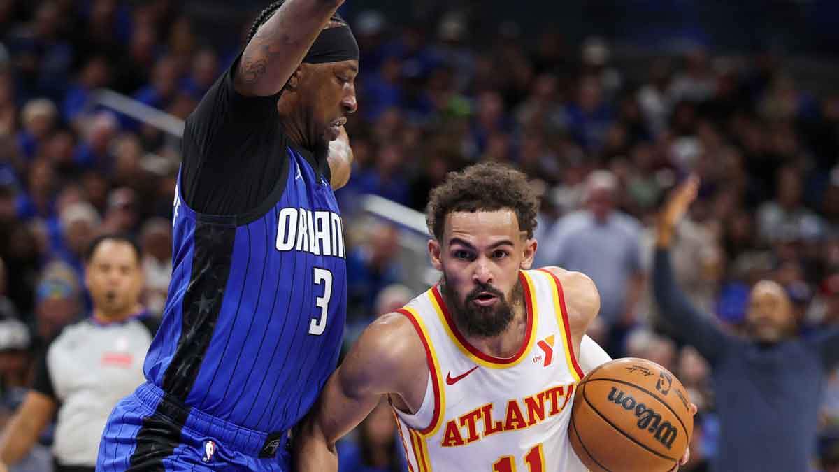 Atlanta Hawks guard Trae Young (11) controls the ball against the Orlando Magic in the second quarter at Kia Center.