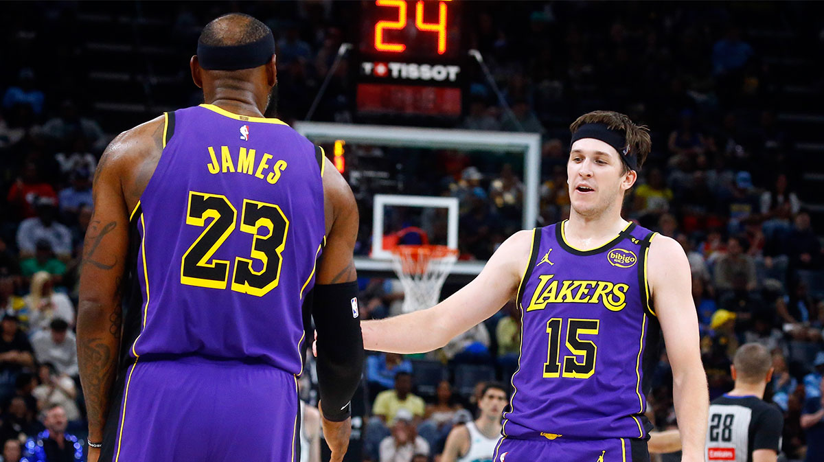 NBA: Los Angeles Lakers at Memphis Grizzlies Mar 29, 2025; Memphis, Tennessee, USA; Los Angeles Lakers guard Austin Reaves (15) reacts with forward LeBron James (23) during the second quarter against the Memphis Grizzlies at FedExForum.