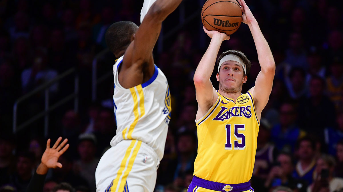 Los Angeles Lakers guard Austin Reaves (15) shoots against the Golden State Warriors during the first half at Crypto.com Arena.