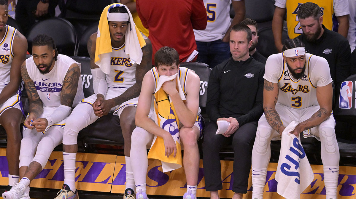 Los Angeles Lakers forward Jarred Vanderbilt (2) and guard Austin Reaves (15) and forward Anthony Davis (3) react in the fourth quarter against the Denver Nuggets during game three of the Western Conference Finals for the 2023 NBA playoffs at Crypto.com Arena.
