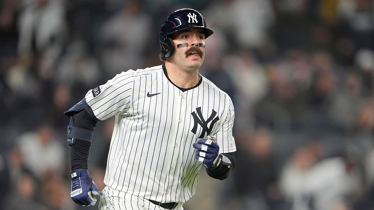 New York Yankees catcher Austin Wells (28) rounds the bases after hitting a home run against the Kansas City Royals during the fifth inning at Yankee Stadium.