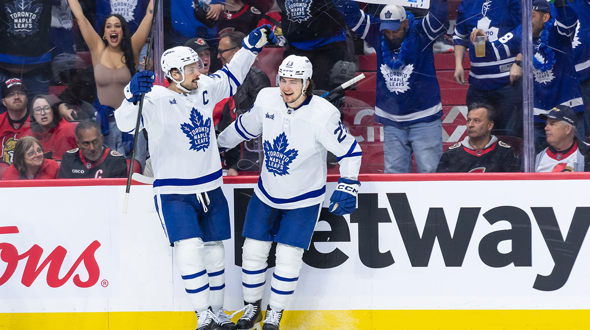 Toronto Maple Leafscenter Auston Matthews (34) celebrates with left wing Matthew Knies (23) his goal scored in the second period against the Ottawa Senators in game four of the first round of the 2025 Stanley Cup Playoffs at Canadian Tire Centre.