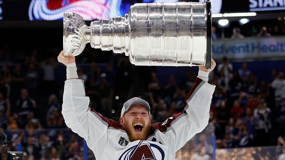 Colorado Avalanche left wing Gabriel Landeskog (92) celebrates with the Stanley Cup after the game against the Tampa Bay Lightning in game six of the 2022 Stanley Cup Final at Amalie Arena.
