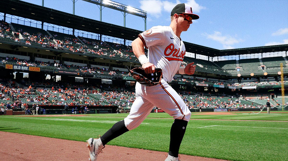 Baltimore Orioles outfielder Tyler O'Neill (9) runs on to the field before a game against the Toronto Blue Jays at Oriole Park at Camden Yards.