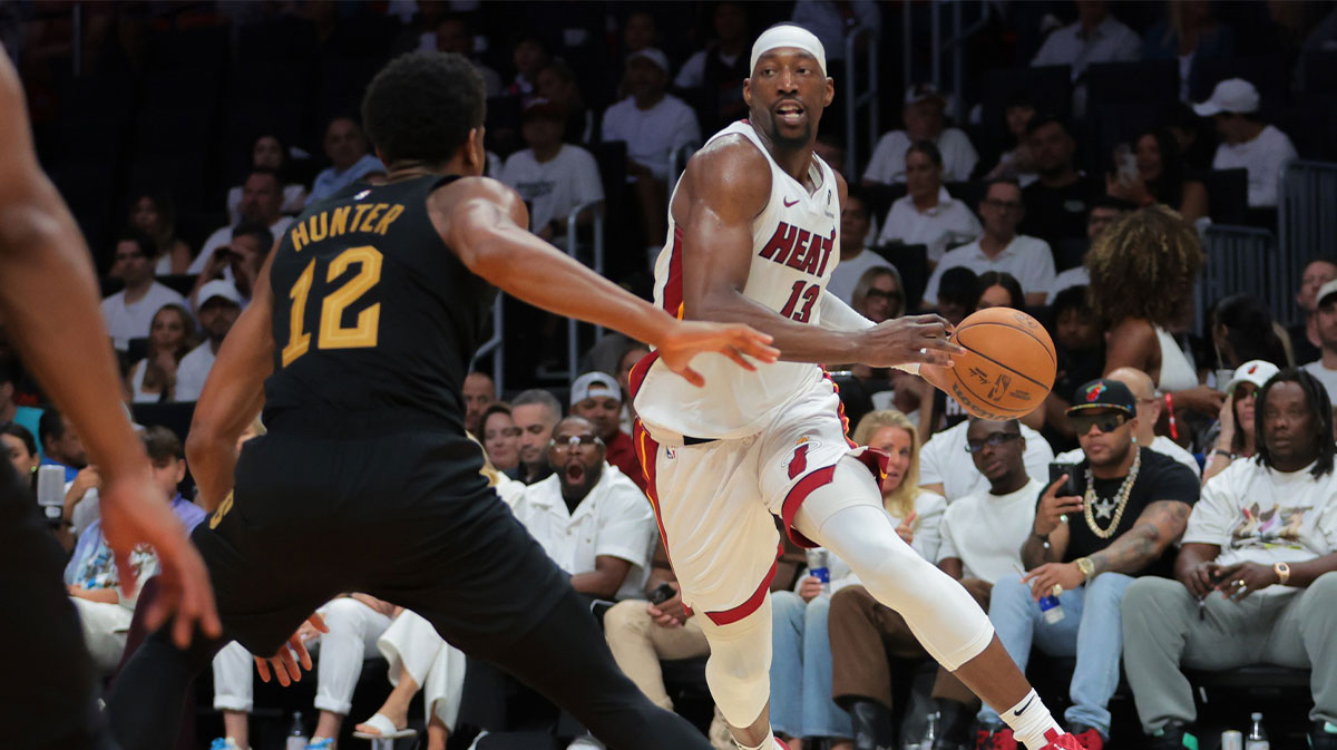 Miami Heat center Bam Adebayo (13) drives to the basket against Cleveland Cavaliers forward De'Andre Hunter (12) in the third quarter during game three for the first round of the 2025 NBA Playoffs at Kaseya Center.