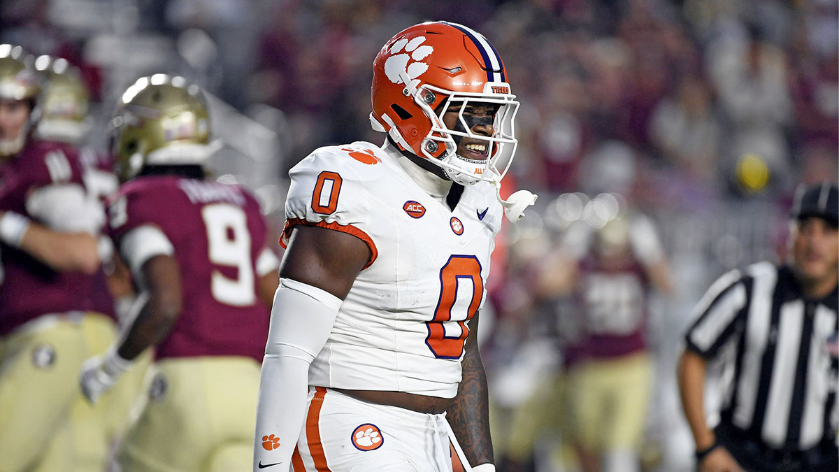 Clemson Tigers linebacker Barrett Carter (0) celebrates after a sack against the Florida State Seminoles during the first half at Doak S. Campbell Stadium.