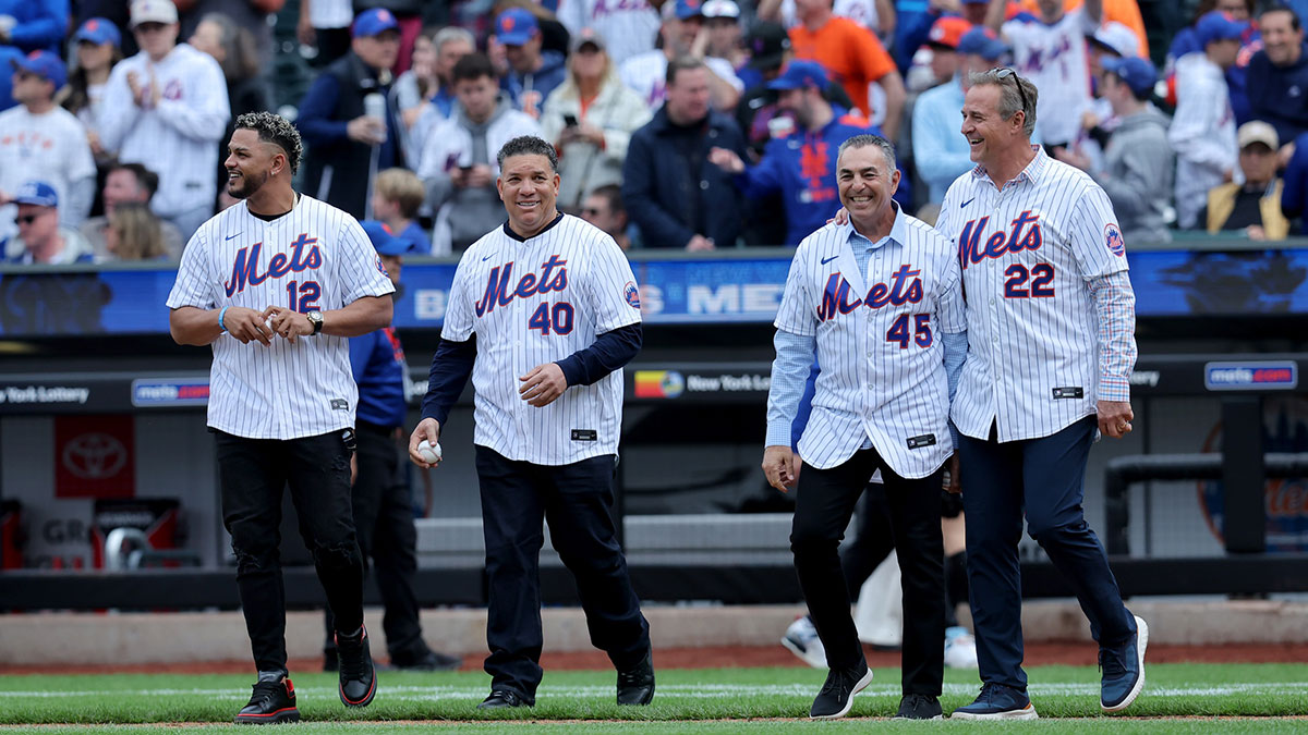 New York Mets former players Juan Lagares (12) and Bartolo Colon (40) and John Franco (45) and Al Leiter (22) walk onto the field for a ceremonial first pitch before the Mets home opener against the Toronto Blue Jays at Citi Field.