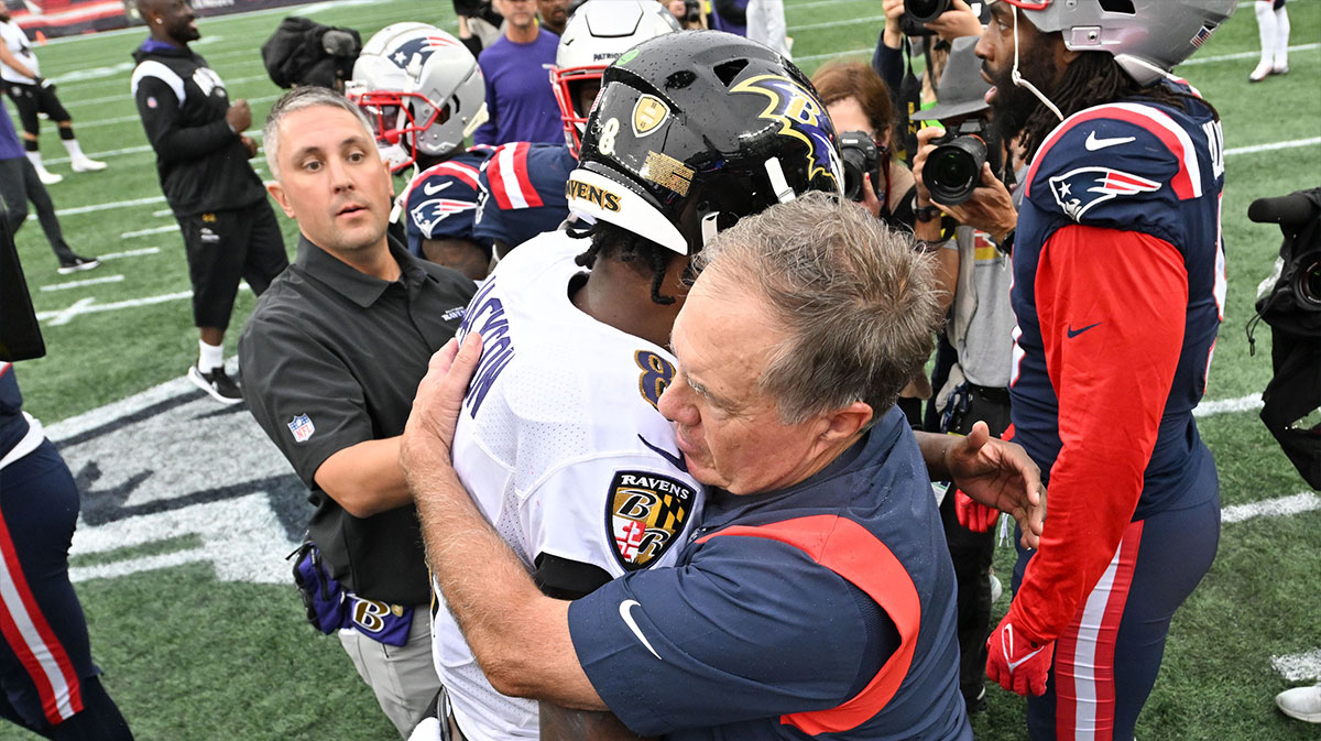 New England Patriots head coach Bill Belichick hugs Baltimore Ravens quarterback Lamar Jackson (8) after a game at Gillette Stadium.