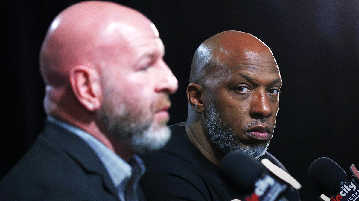 Portland Trail Blazers head coach Chauncey Billups (right) listens to Trail Blazers’ general manager Joe Cronin answer a question during a press conference before Portland plays their last season game against Los Angeles Lakers at Moda Center.