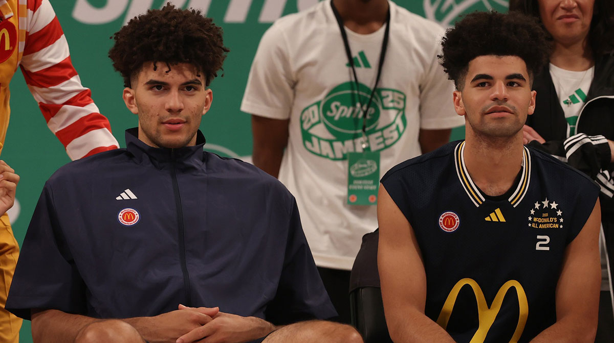 McDonald’s All Americans East forward Cameron Boozer (12), left, and East guard Cayden Boozer (2), right, sit on the court during the Sprite Jam Fest at Barclay's Center.