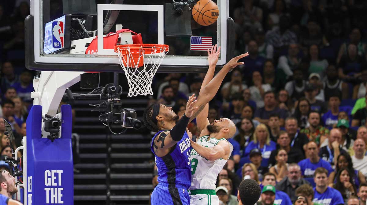 Boston Celtics guard Derrick White (9) shoots against Orlando Magic center Wendell Carter Jr. (34) during the second quarter of game three of first round for the 2024 NBA Playoffs at Kia Center.