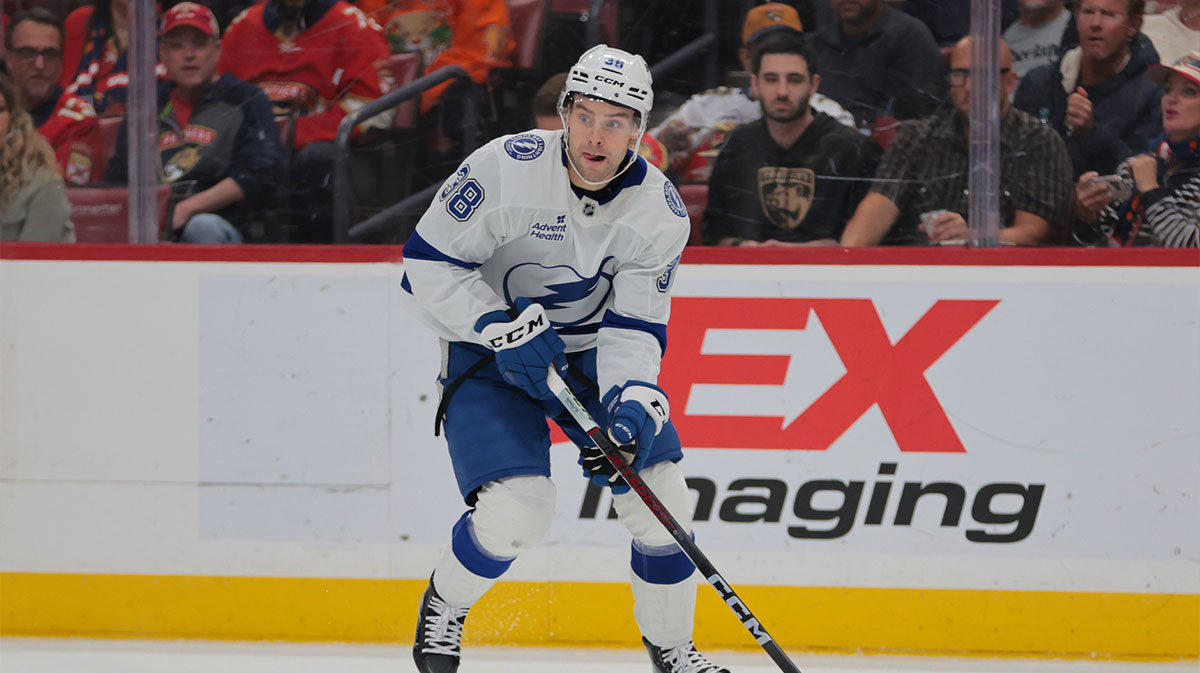 Tampa Bay Lightning left wing Brandon Hagel (38) moves the puck against the Florida Panthers during the first period at Amerant Bank Arena.