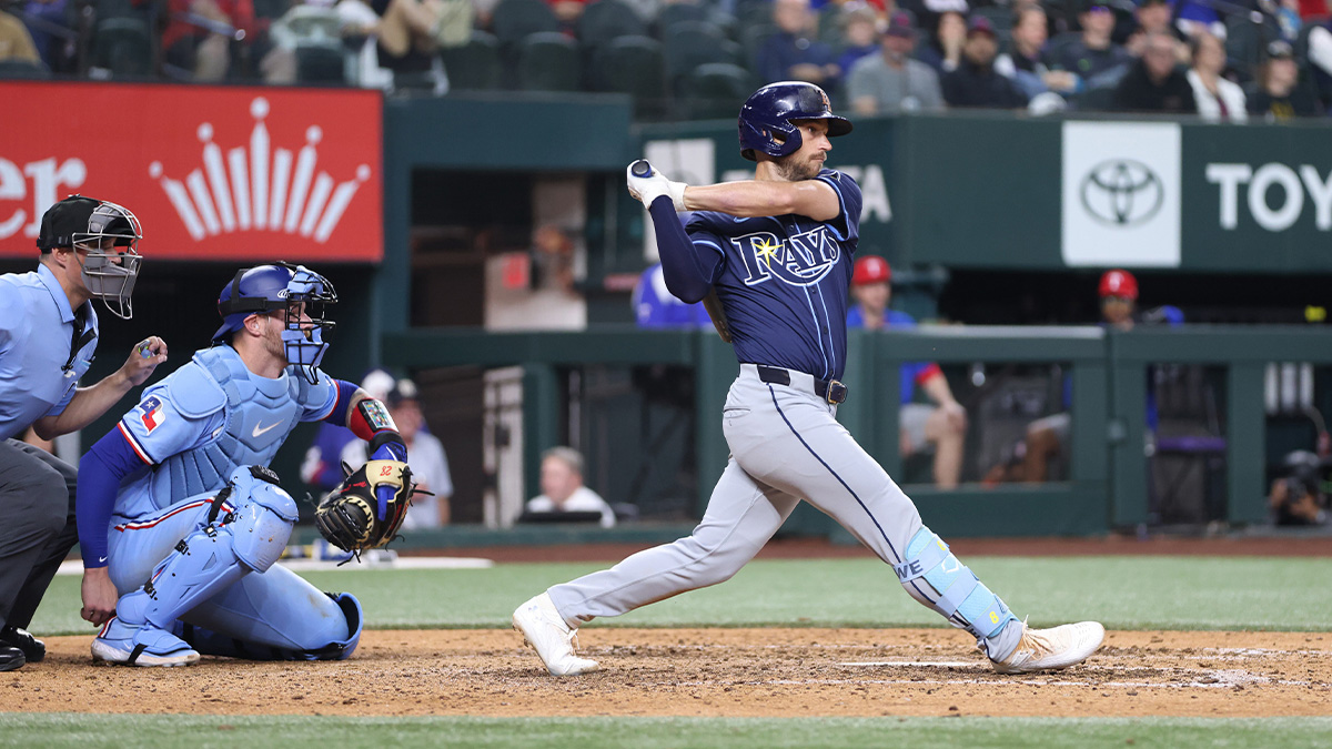 Tampa Bay Rays second base Brandon Lowe (8) drives in a run in the eighth inning against the Texas Rangers at Globe Life Field.