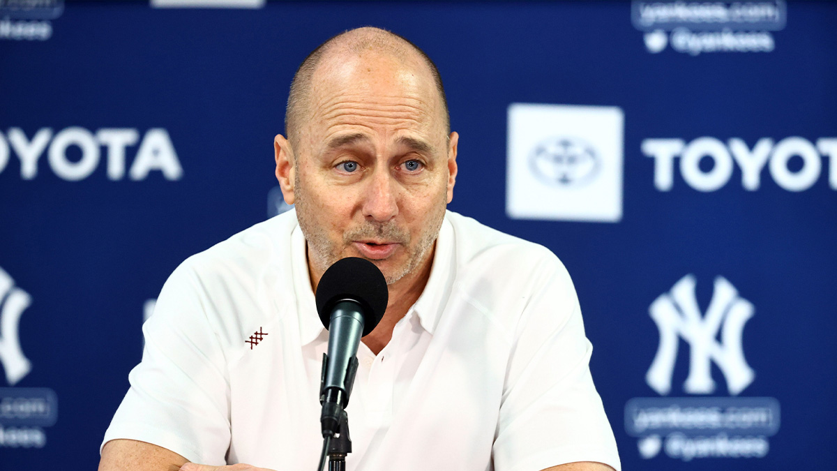 Mar 14, 2022; Tampa, FL, USA; New York Yankees general manager Brian Cashman talks with media during spring training workouts at George M. Steinbrenner Field.