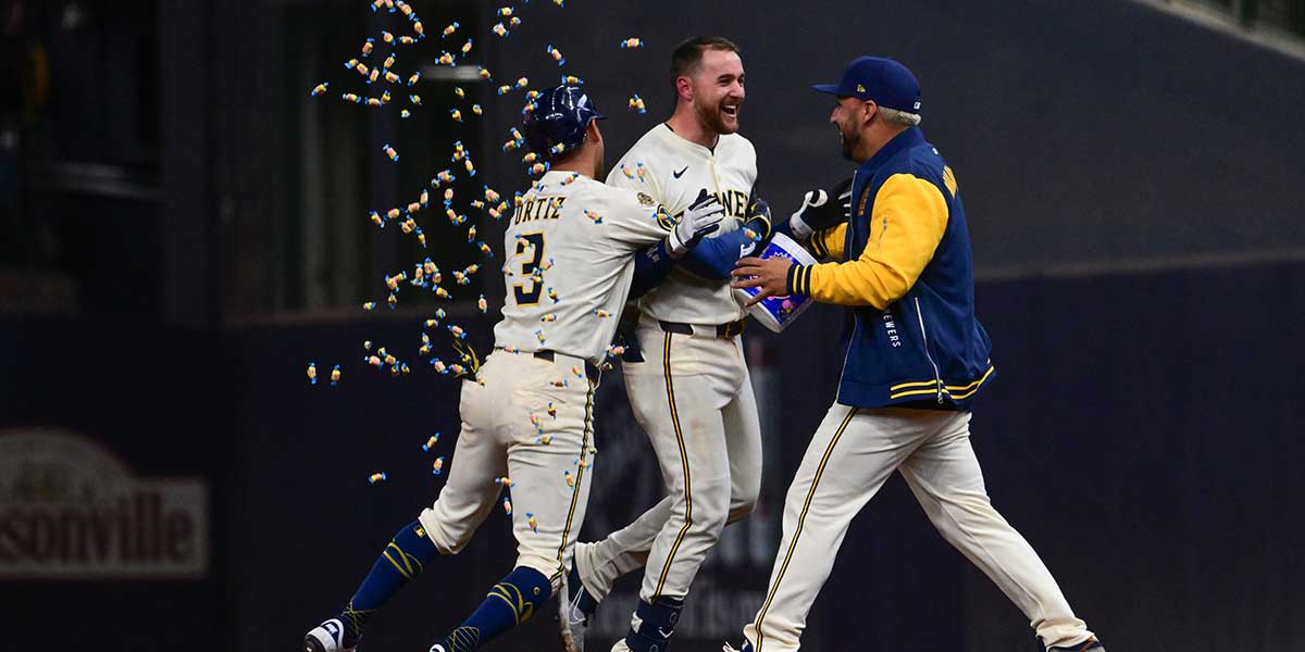 Milwaukee Brewers second baseman Brice Turang (2) celebrates a walkoff win after driving in the winning run in the eleventh inning against the Kansas City Royals at American Family Field.