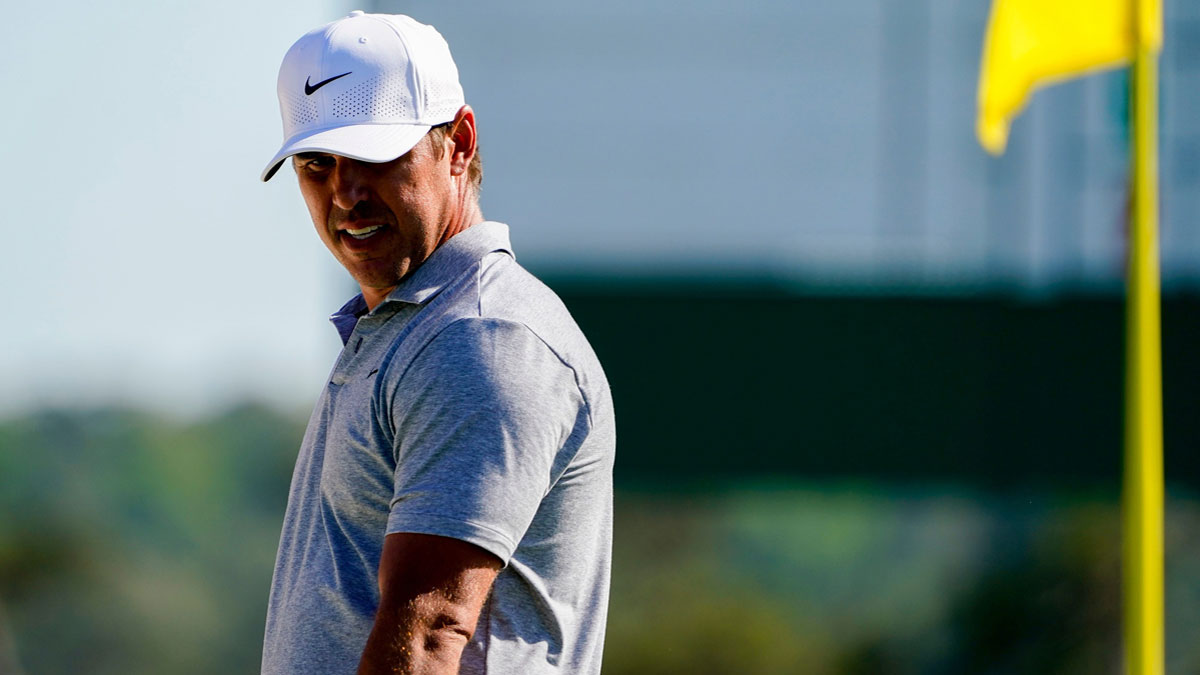 Brooks Koepka walks on the No. 18 green during the third round of the Masters Tournament