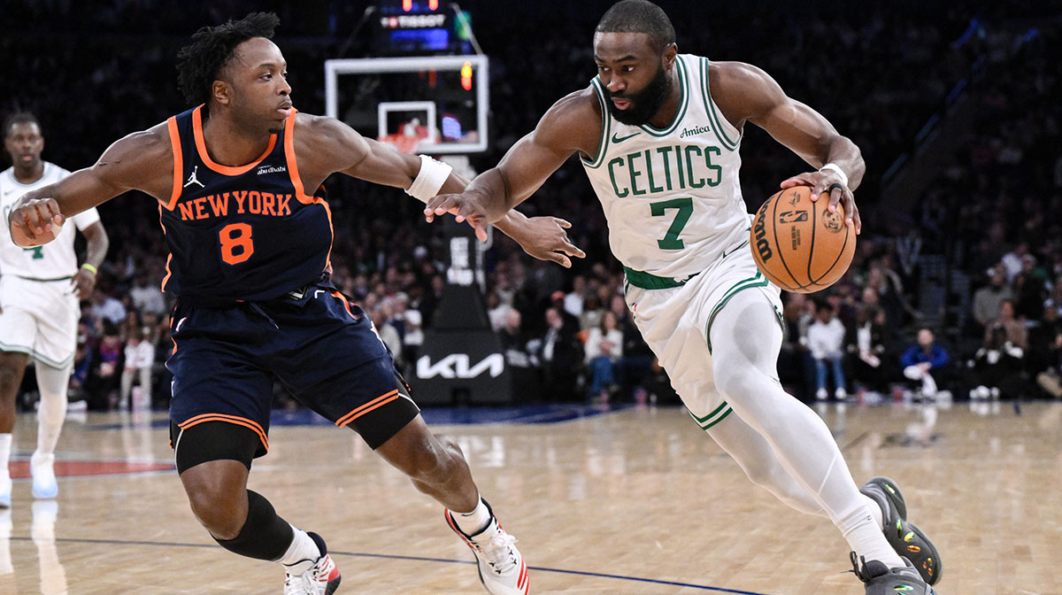 Boston Celtics guard Jaylen Brown (7) drives past New York Knicks forward OG Anunoby (8) during the second half at Madison Square Garden