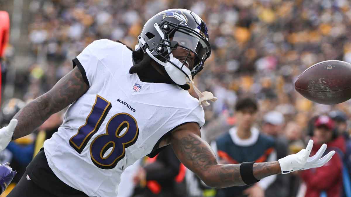 Baltimore Ravens wide receiver Diontae Johnson (18) reaches for an incomplete pass against the Pittsburgh Steelers during the first quarter at Acrisure Stadium.