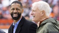 Cleveland Browns managing and principal partner Jimmy Haslam (right) laughs with executive vice president of football operations Andrew Berry before the game against the Tampa Bay Buccaneers at FirstEnergy Stadium.