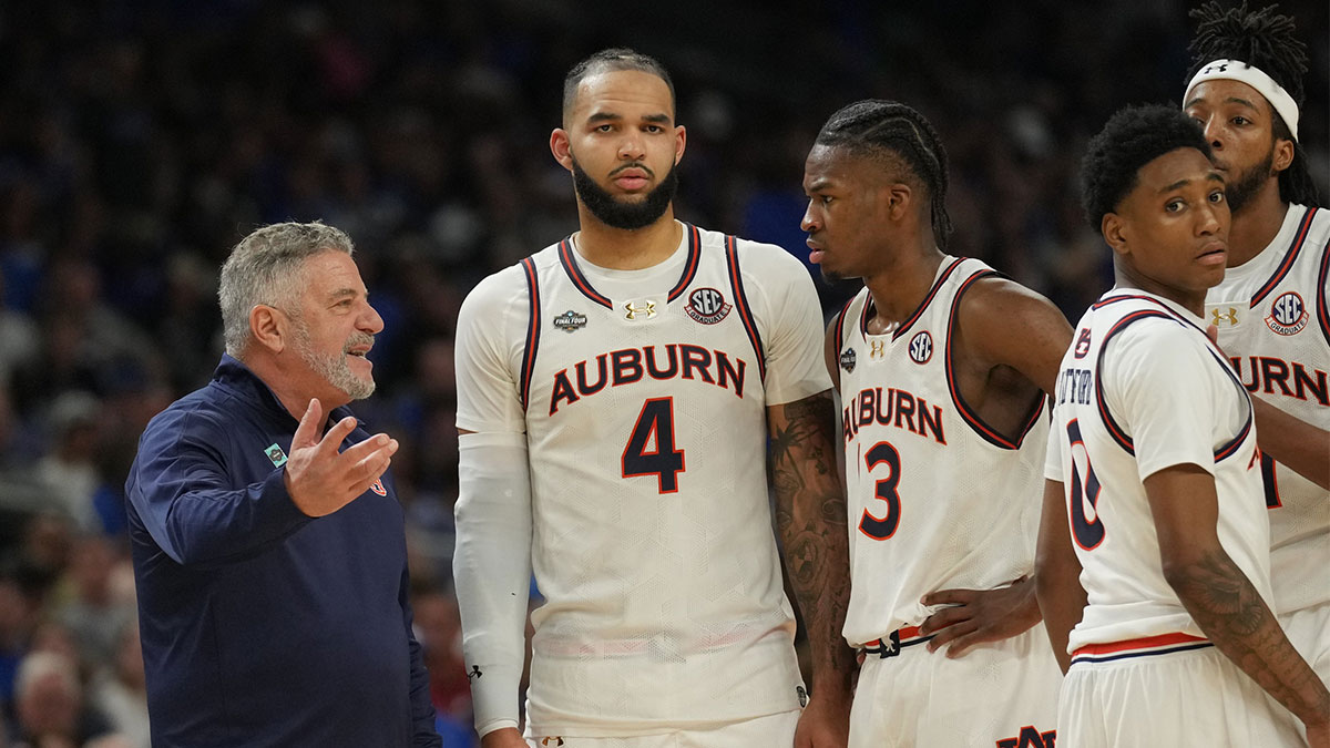 Auburn Tigers head coach Bruce Pearl talks with his players against the Florida Gators in the semifinals of the men's Final Four of the 2025 NCAA Tournament at the Alamodome. Mandatory Credit: Robert Deutsch-Imagn Images
