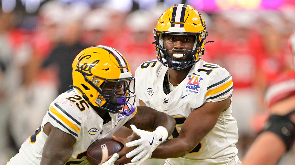 California Golden Bears quarterback CJ Harris (16) to running back Jaivian Thomas (25) in the first half against the UNLV Rebels at SoFi Stadium.