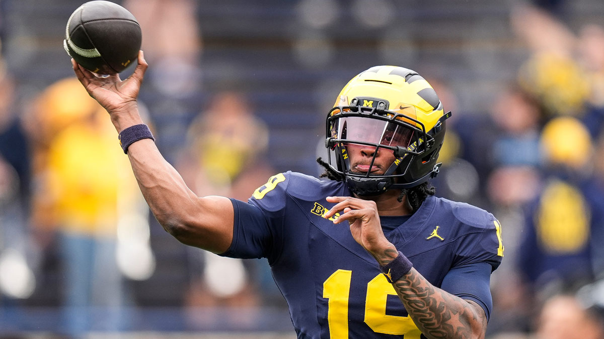 Michigan quarterback Bryce Underwood (19) throws at warm up before the spring game at Michigan Stadium