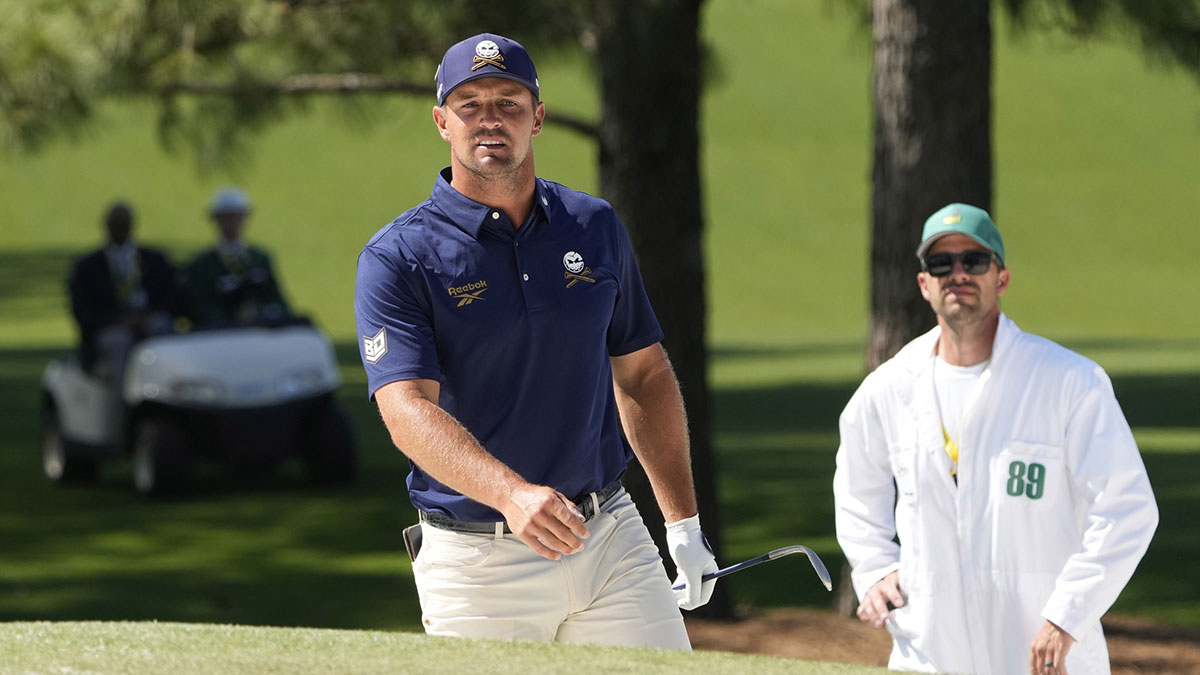 Bryson DeChambeau reacts after playing a shot from the bunker on the seventh hole during the final round of the Masters Tournament at Augusta National Golf Club.