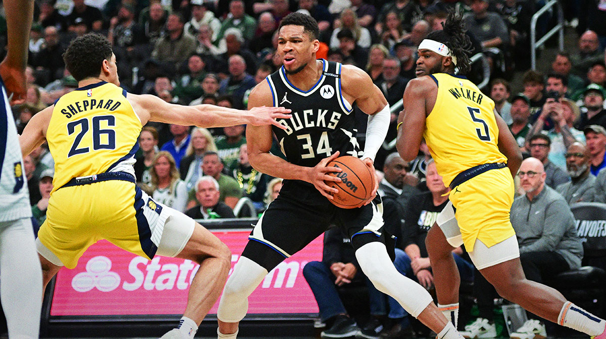 Milwaukee Bucks forward Giannis Antetokounmpo (34) looks for a shot against Indiana Pacers guard Ben Sheppard (26) and forward Jarace Walker (5) in the third quarter during game four of first round for the 2024 NBA Playoffs at Fiserv Forum.