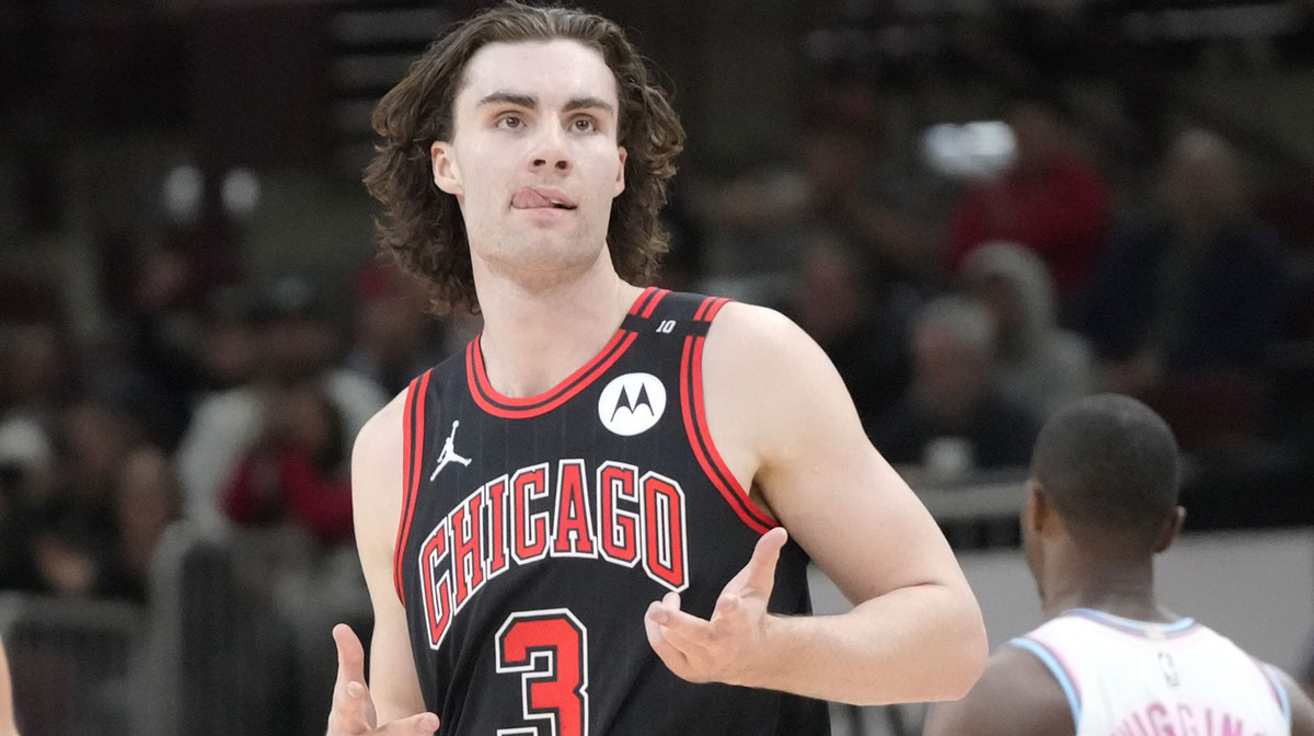 Chicago Bulls guard Josh Giddey (3) reacts after making a three point basket against the Miami Heat during the second half at United Center.