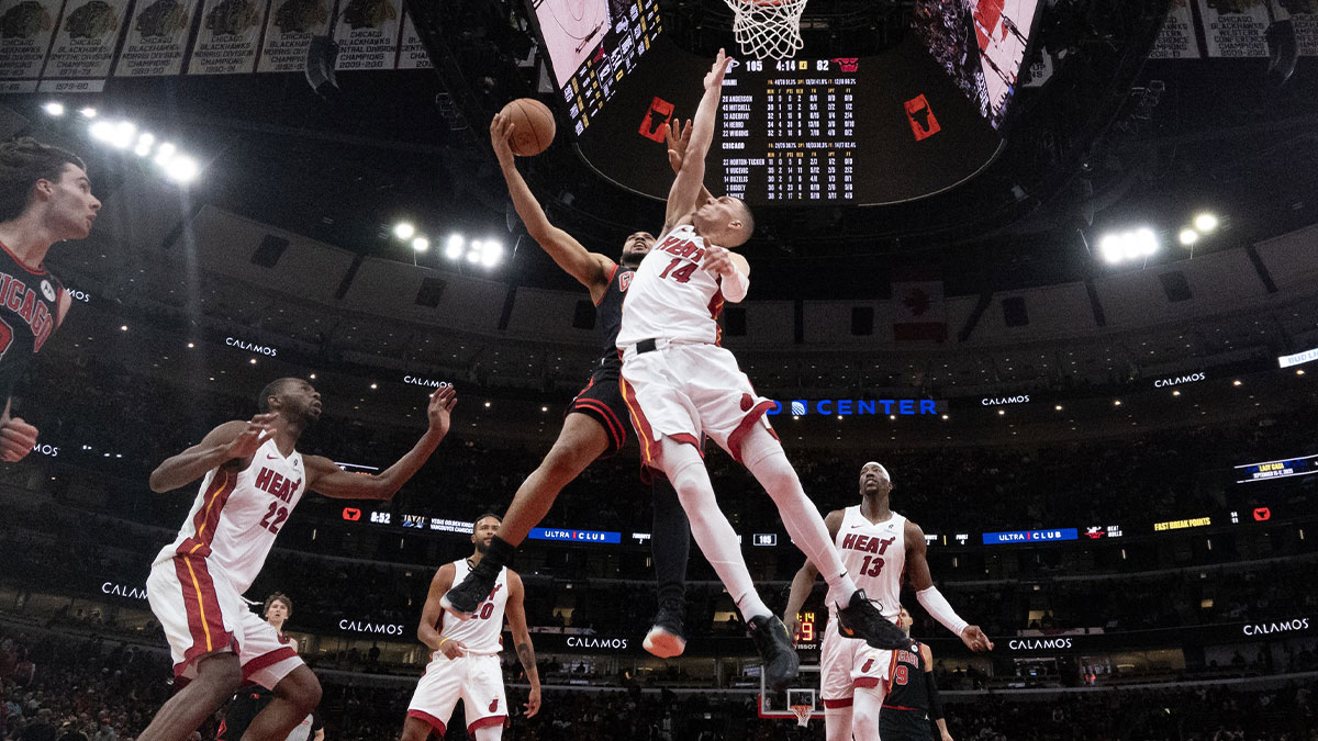 Miami Heat guard Tyler Herro (14) defends Chicago Bulls forward Talen Horton-Tucker (22) during the second half at United Center.