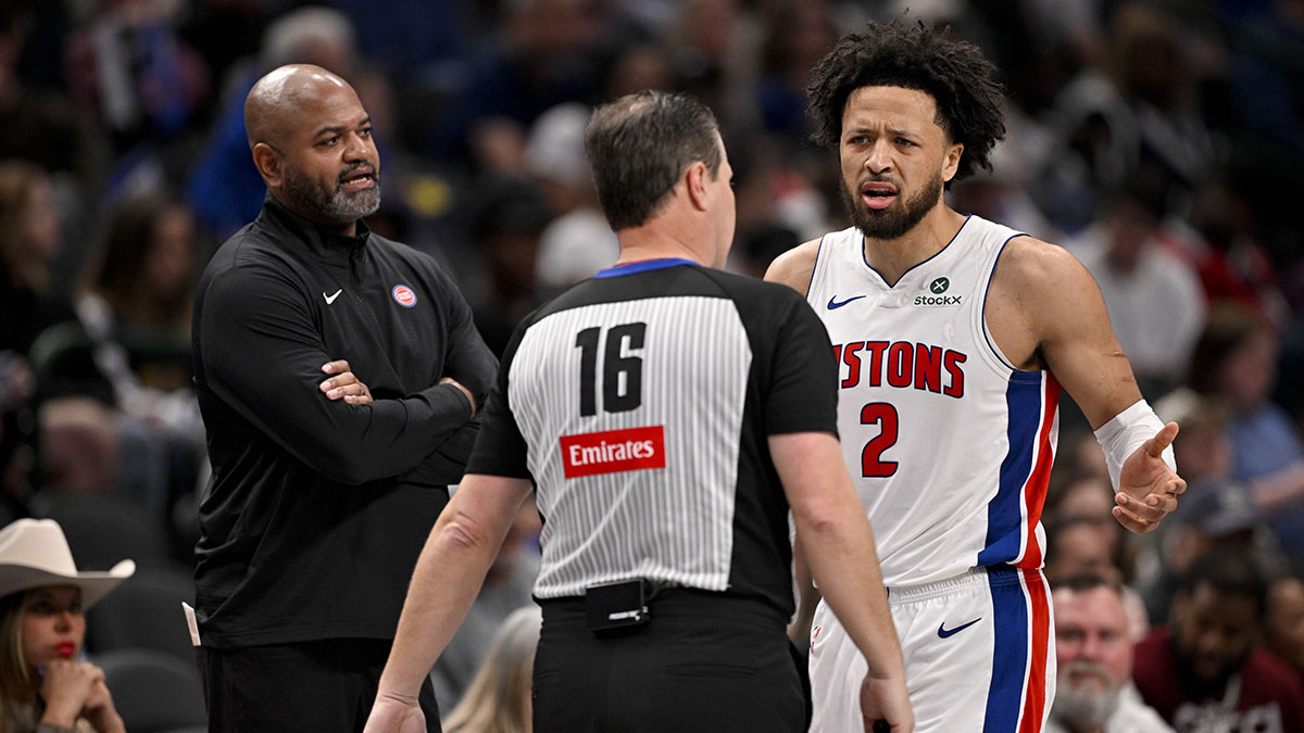 Detroit Pistons guard Cade Cunningham (2) and head coach J.B. Bickerstaff react to a technical foul call by referee David Guthrie (16) during the second half against the Dallas Mavericks at the American Airlines Center.