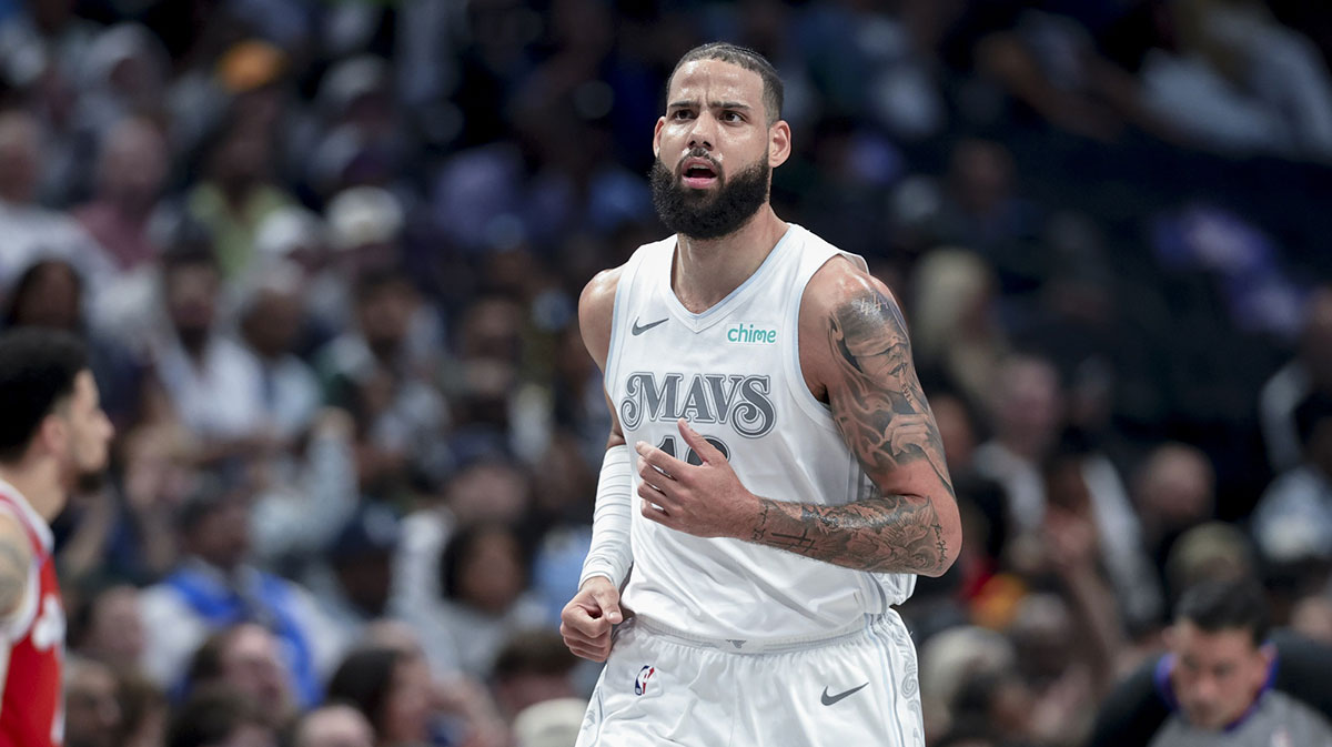 Dallas Mavericks forward Caleb Martin (16) reacts during the second half against the Memphis Grizzlies at American Airlines Center.