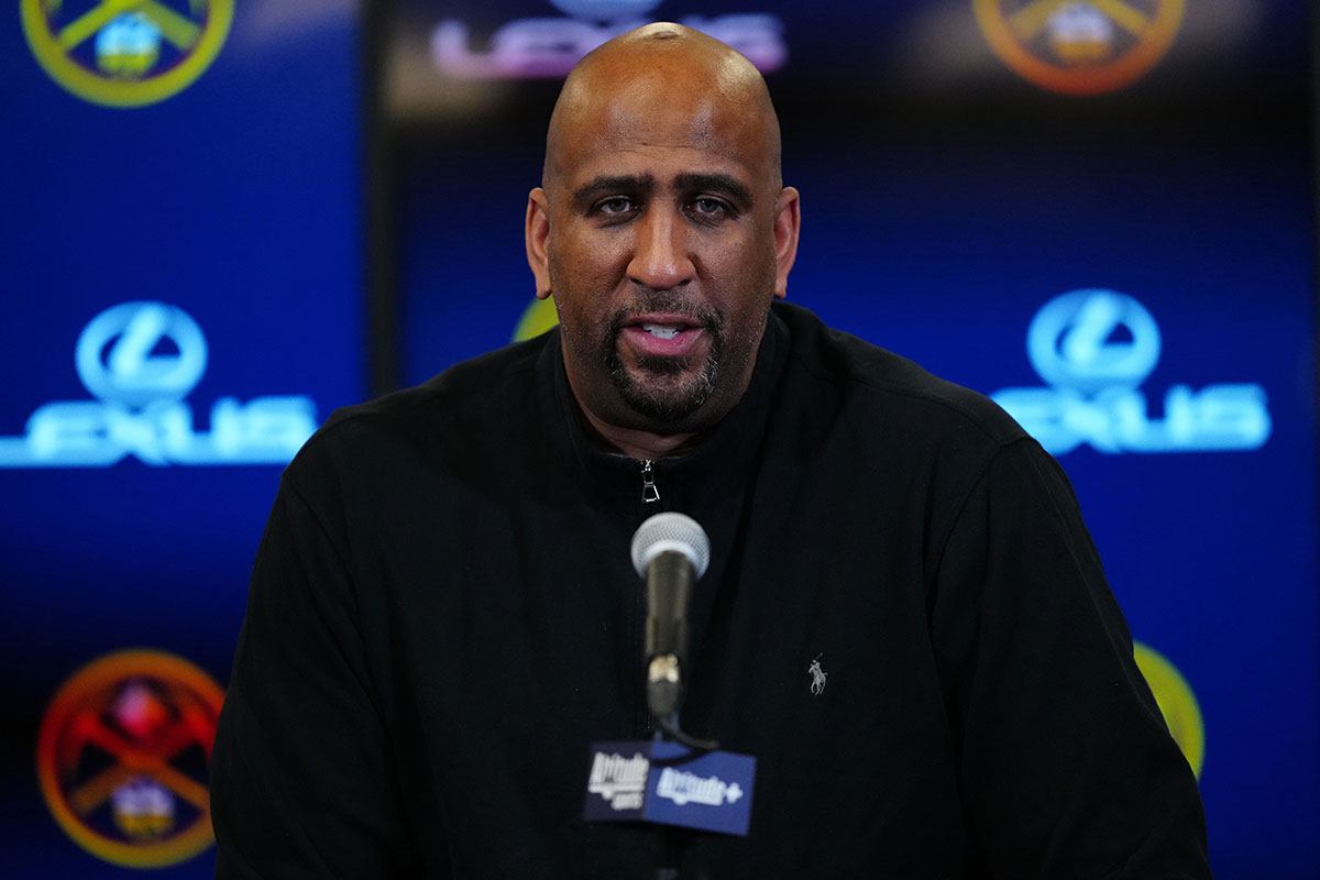 Denver Nuggets general manager Calvin Booth speaks to the media before a game against the Orlando Magic at Ball Arena.