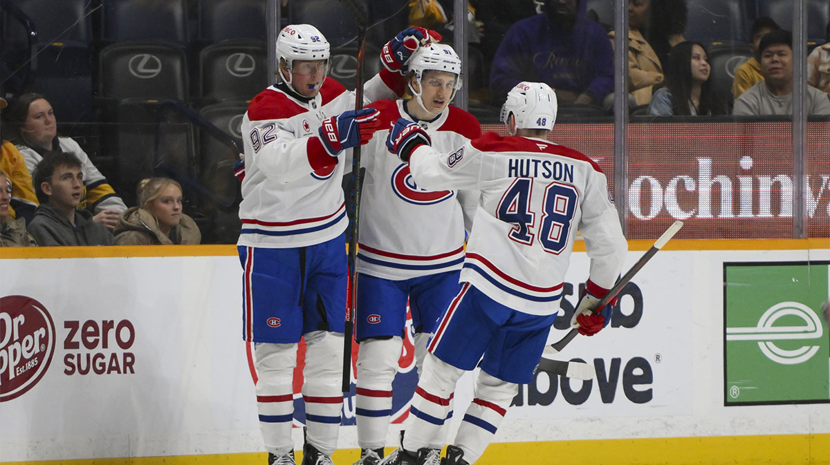 Montreal Canadiens right wing Patrik Laine (92) celebrates his goal with his teammates against the Nashville Predators during the second period at Bridgestone Arena.