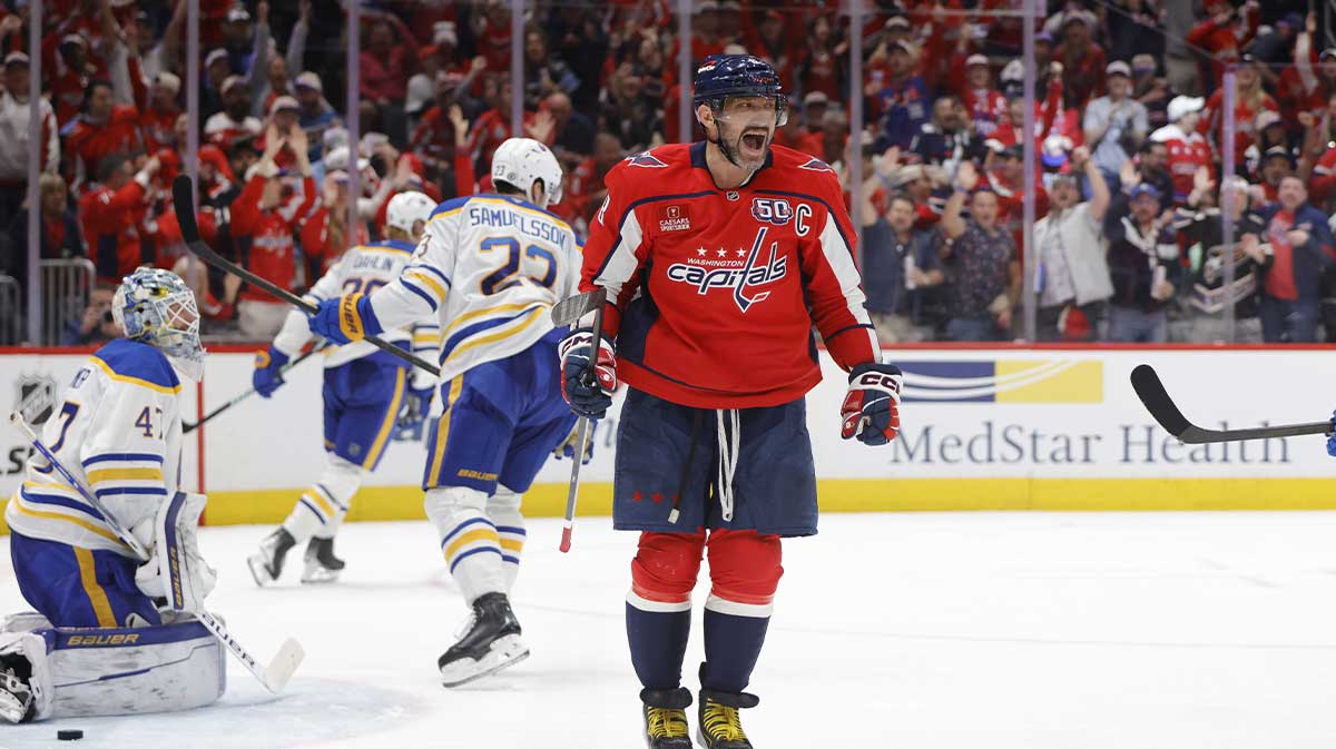 Washington Capitals left wing Alex Ovechkin (8) celebrates after scoring a goal past Buffalo Sabres goaltender James Reimer (47) during the third period at Capital One Arena