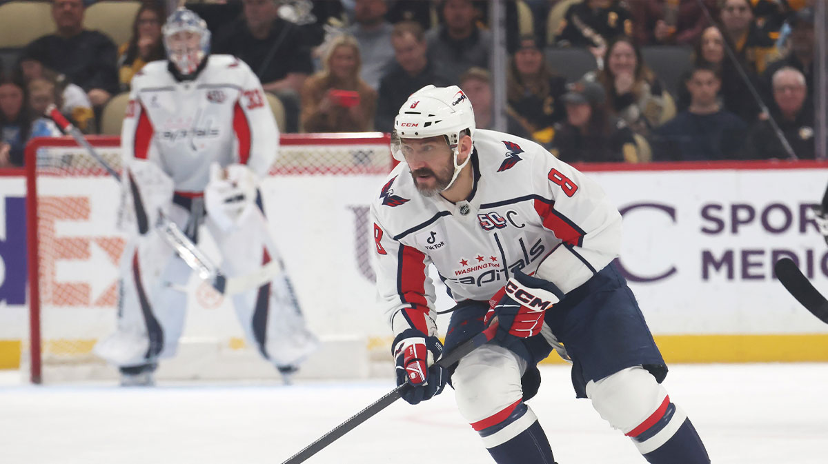 Washington Capitals left wing Alex Ovechkin (8) skates with the puck against the Pittsburgh Penguins during the first period at PPG Paints Arena.