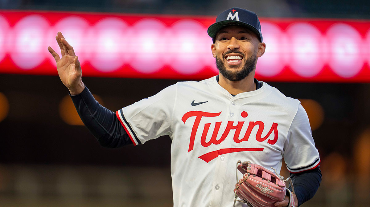 Minnesota Twins shortstop Carlos Correa (4) smiles after making a diving catch against the New York Mets in the fifth inning at Target Field. All players wore #42 for Jackie Robinson Day