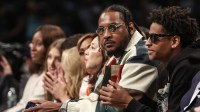 Former NBA forward Carmelo Anthony and his son Kyian Anthony during game two of the 2024 WNBA Semi-finals at Barclays Center.