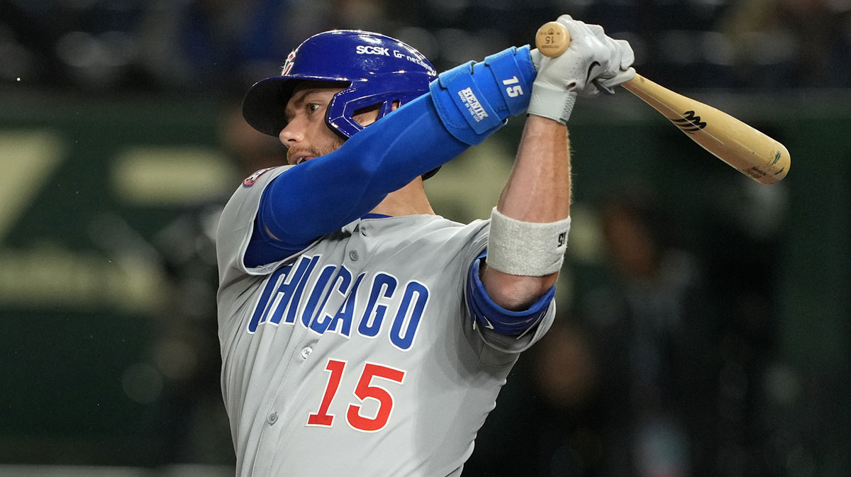 Chicago Cubs catcher Carson Kelly (15) bats during the fourth inning against the Los Angeles Dodgers during the Tokyo Series at Tokyo Dome.