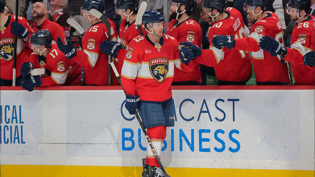 Florida Panthers center Carter Verhaeghe (23) celebrates with teammates after scoring on an empty net against the Toronto Maple Leafs during the third period at Amerant Bank Arena.