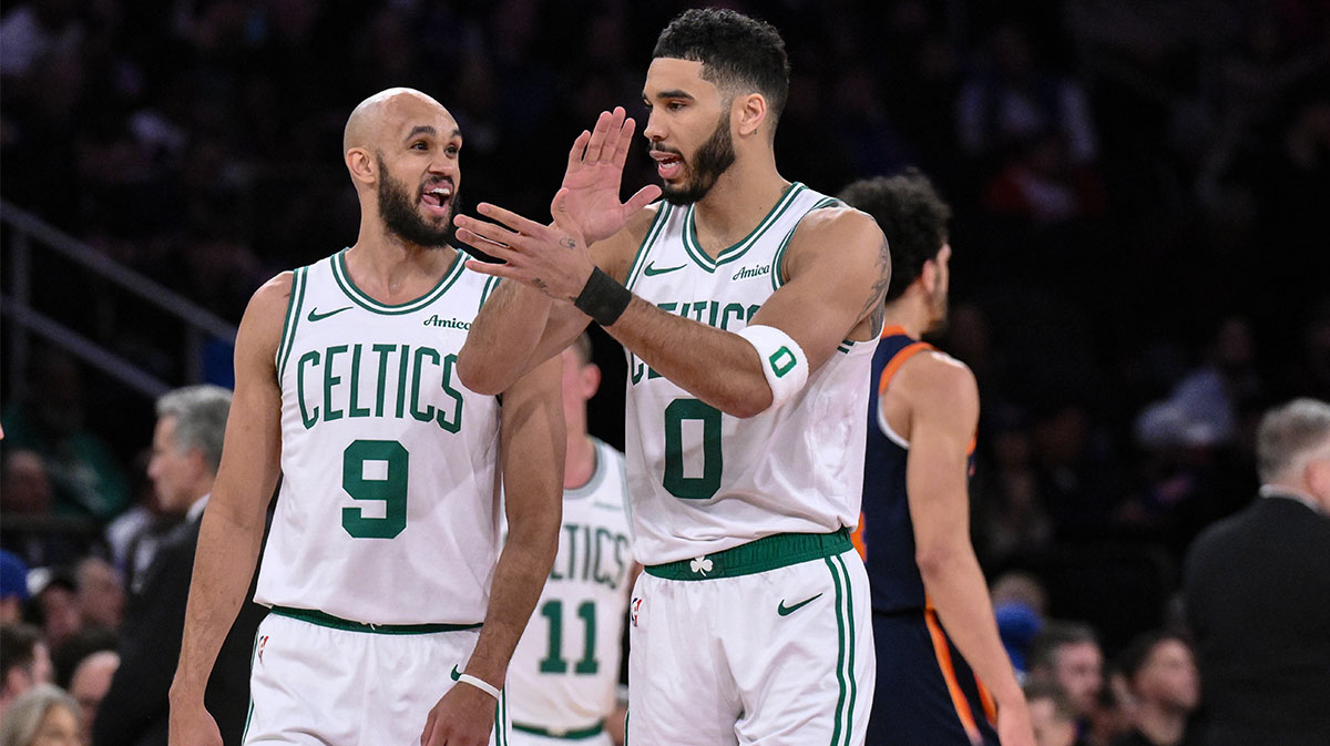 Celtics forward Jayson Tatum (0) and Boston Celtics guard Derrick White (9) react during the first half against the New York Knicks at Madison Square Garden