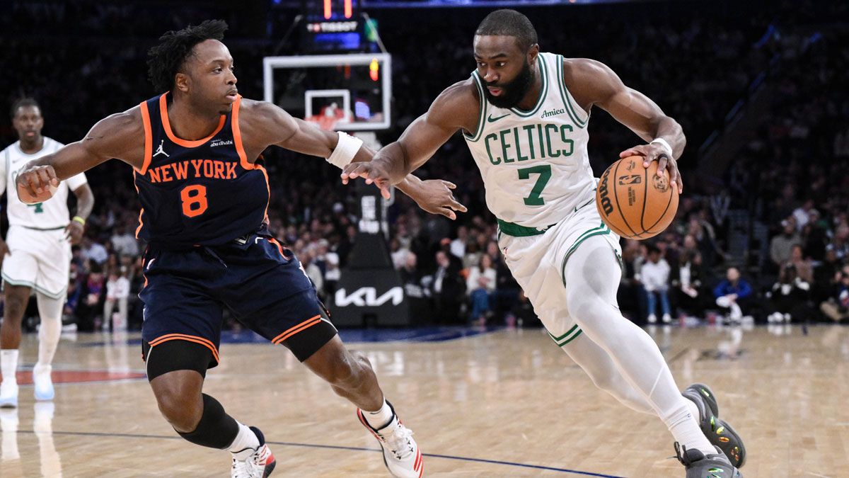 Boston Celtics guard Jaylen Brown (7) drives past New York Knicks forward OG Anunoby (8) during the second half at Madison Square Garden.
