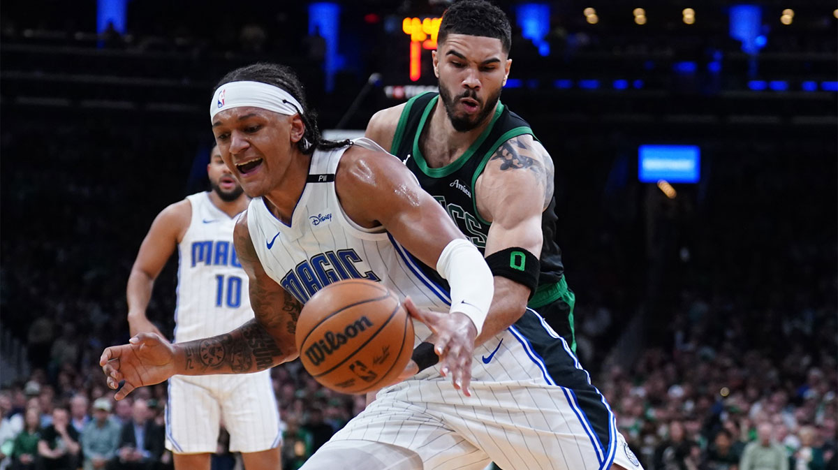 Boston Celtics forward Jayson Tatum (0) defends against Orlando Magic forward Paolo Banchero (5) in the second quarter during game five of first round for the 2025 NBA Playoffs at TD Garden