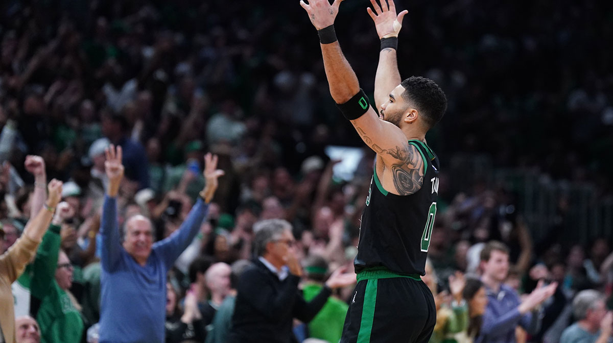 Boston Celtics forward Jayson Tatum (0) reacts after a three point basket by Boston Celtics center Al Horford (42) (not pictured) against the Orlando Magic in the third quarter during game five of first round for the 2025 NBA Playoffs at TD Garden.
