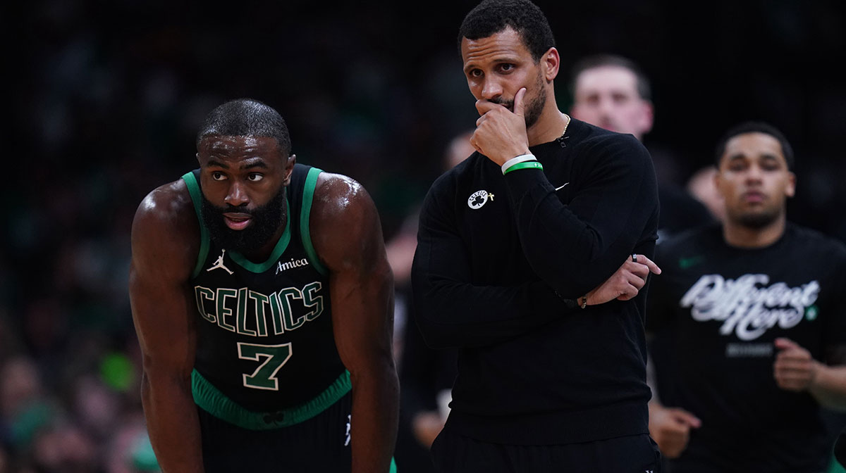 Boston Celtics head coach Joe Mazzulla talks with guard Jaylen Brown (7) from the sideline as they take on the Orlando Magic during game five of first round for the 2025 NBA Playoffs at TD Garden.
