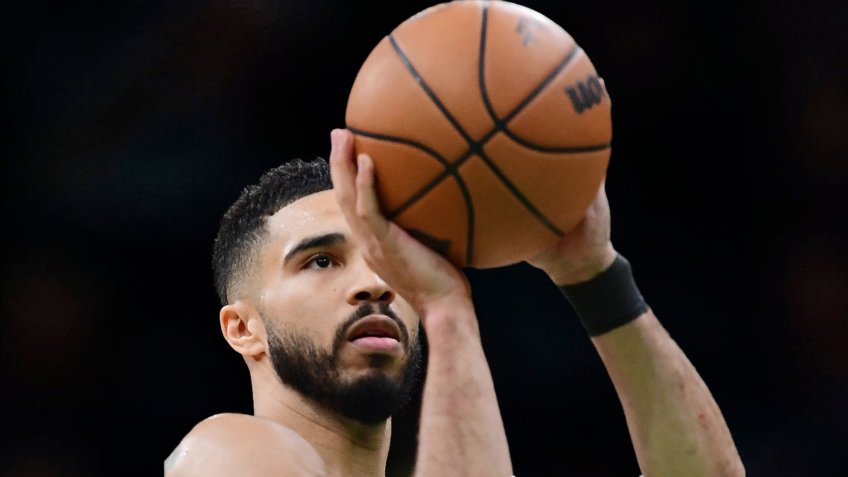 Boston Celtics forward Jayson Tatum (0) shoots a free throw during the second half against the Orlando Magic at TD Garden.