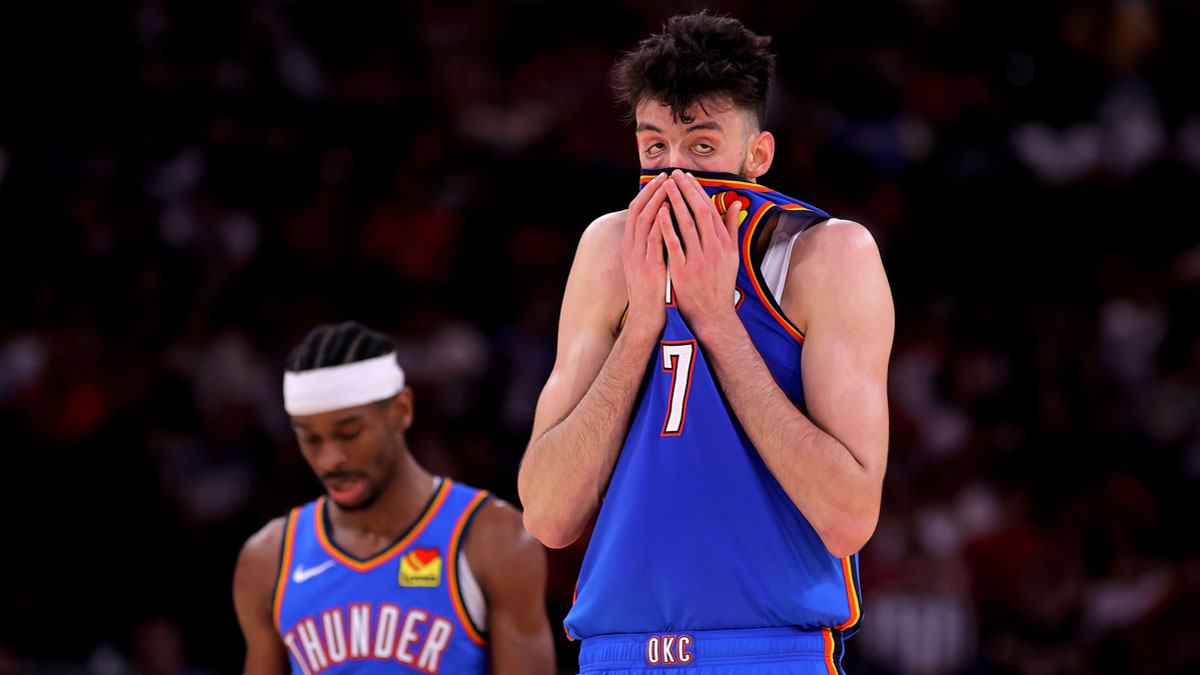 Oklahoma City Thunder forward Chet Holmgren (7) and guard Shai Gilgeous-Alexander (2) during a timeout against the Houston Rockets during the third quarter at Toyota Center.