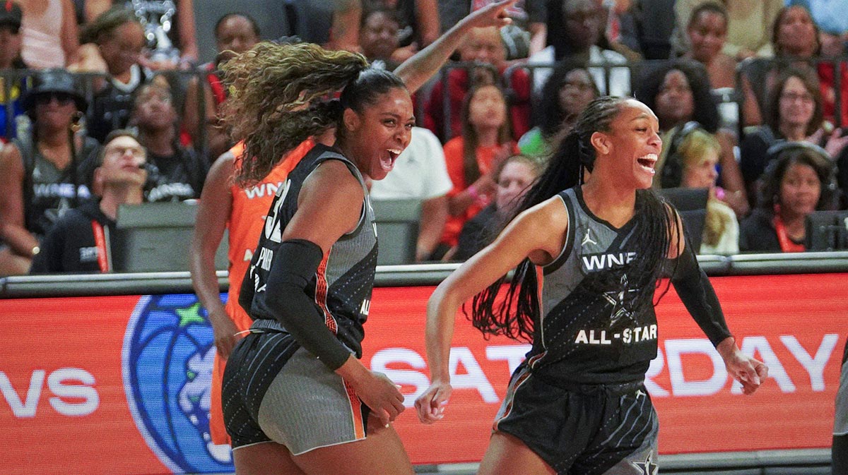 Team Wilson's Las Vegas Aces Cheyenne Parker (32) and frontcourt Aja Wilson (22) celebrate after scoring against Team Stewart during the second half the 2023 WNBA All-Star Game at Michelob Ultra Arena.