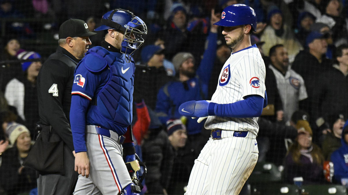 Apr 8, 2025; Chicago, Illinois, USA; Chicago Cubs outfielder Kyle Tucker (30) scores during the fifth inning against the Texas Rangers at Wrigley Field. Mandatory Credit: Matt Marton-Imagn Images